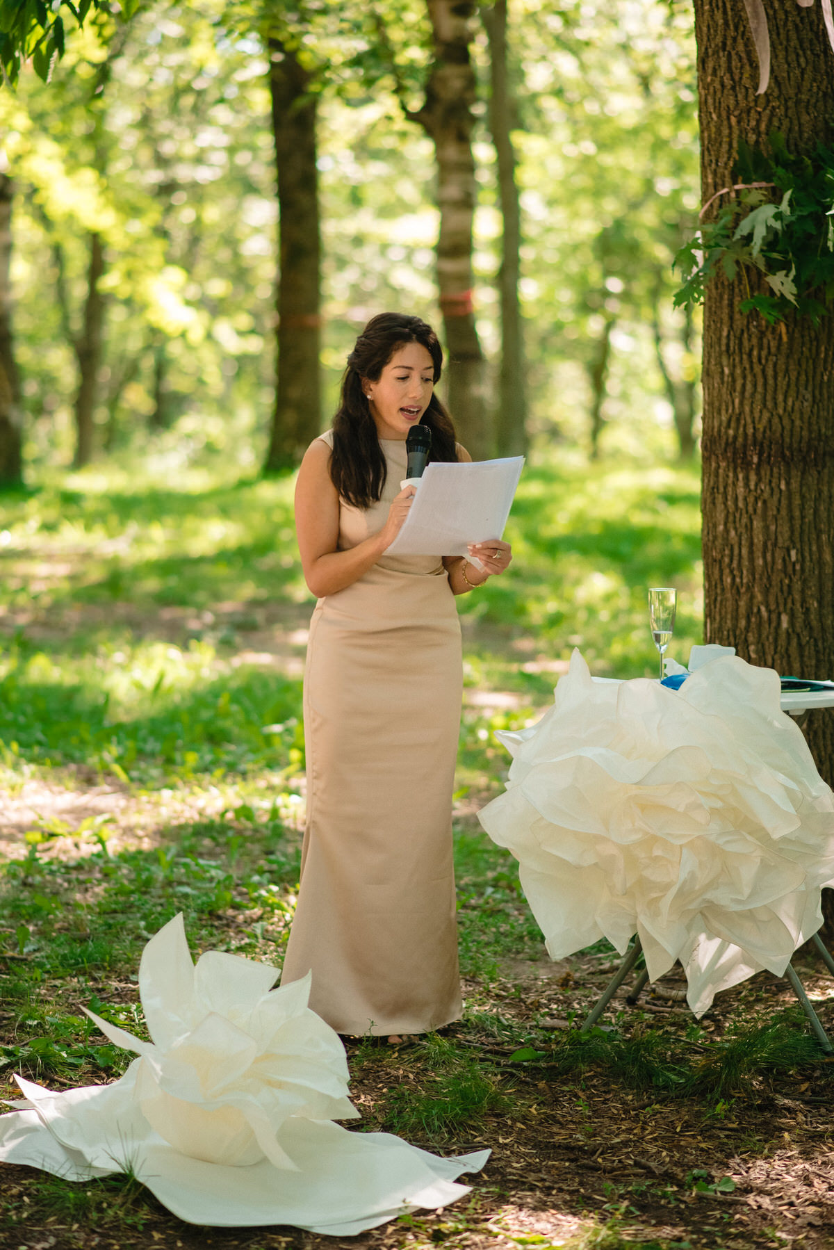 Groom's sister reading during wedding ceremony