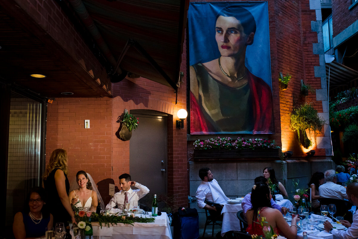 Wedding couple having dinner at Il Cortile restaurant during their wedding during the pandemic