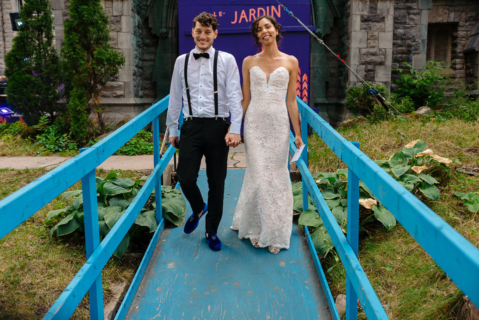 Wedding couple walking down blue ramp at St Jax Montreal