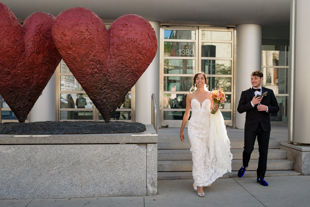 Wedding couple walking down stairs of Musée des Beaux Arts de Montreal