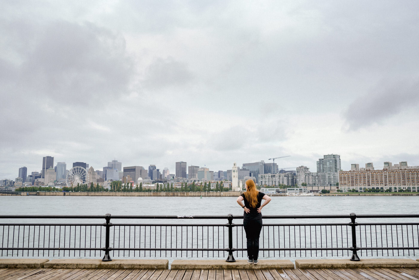 Woman looking out at the view of Montreal from Parc Jean-Drapeau